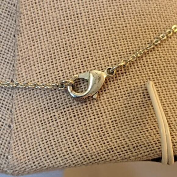 Graduated Bezel Set Rhinestones on a Snake Pendant on a Silver Tone Chain - Picture 4 of 4